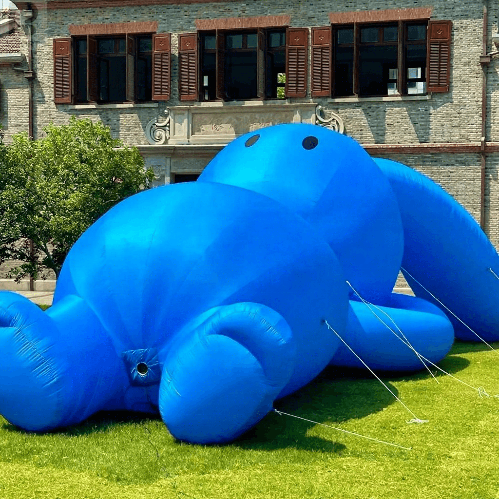 Giant Inflatable Blue Bunny - Lying Rabbit Character for Events and Promotions
